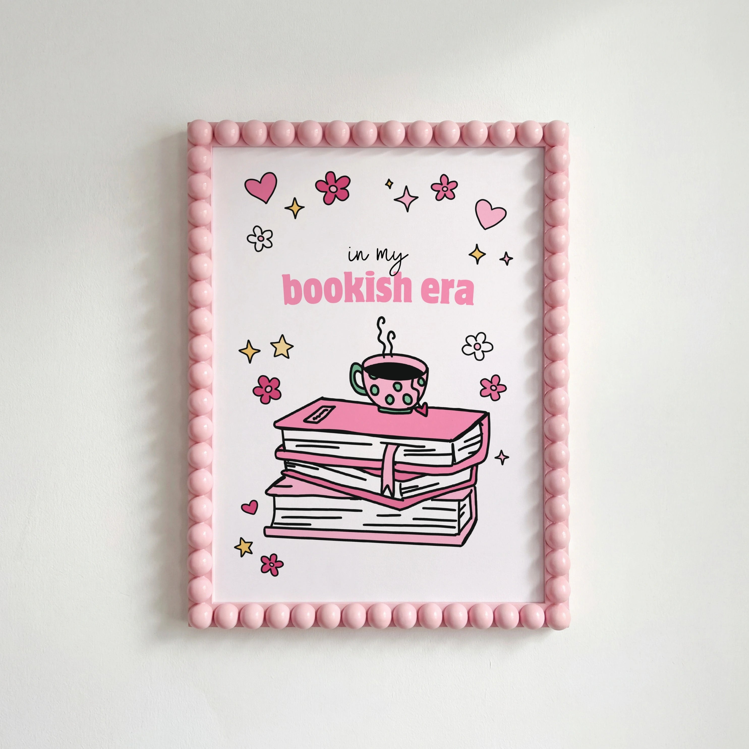 Nella mia era libresca – Stampa di una pila di libri rosa